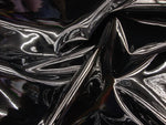 Load image into Gallery viewer, Black patent faux vinyl upholstery fabric per yard
