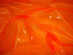 Load image into Gallery viewer, Orange 10 Gauge Transparent Tinted Plastic Vinyl Tinted 54 Inch Wide Fabric 10 Yard roll
