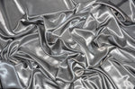Load image into Gallery viewer, Silver satin polyester fabric  60"wide by the yard
