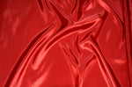 Load image into Gallery viewer, Red Taffeta polyester fabric 58” wide sold  the Yard
