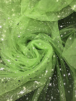 Load image into Gallery viewer, Star sparkle Bursts on lime Sheer Organza 58 Inch Wide Fabric
