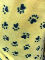 Load image into Gallery viewer, Black paws on yellow Fleece Polar   By The Yard 60"
