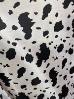 Load image into Gallery viewer, Cow black/ white charmeuse Fabric  58" WIDE / sold by the yard
