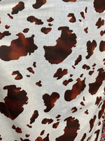 Load image into Gallery viewer, Poly cotton Tan Cow Sold by yard  58" wide
