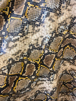 Load image into Gallery viewer, Caramel snake upholstery Faux Leather home stretch Vinyl fabric by the yard 54' Wide
