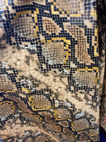 Load image into Gallery viewer, Caramel snake upholstery Faux Leather home stretch Vinyl fabric by the yard 54' Wide

