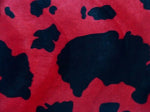 Load image into Gallery viewer, Cow Animal print Velboa Black on Red Spots Fabric BY THE YARD 60" Wide

