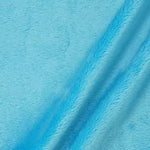 Load image into Gallery viewer, Minky Turquoise solid Soft fur cuddle fabric by THE YARD 60” wide
