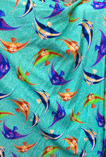 Load image into Gallery viewer, Turquoise stretch spandex with sea fish  fabric SOLD BY YARD 60 inches wide
