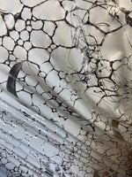 Load image into Gallery viewer, Silver drizzle foil  on white  stretch spandex SOLD BY YARD 60 inches wide
