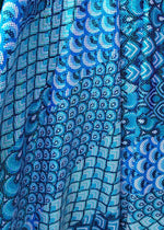 Load image into Gallery viewer, Turquoise Abstract peacock Nylon Spandex print fabric. Great for Dancewear, costumes, leggings. Sold by the Yard.
