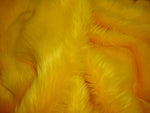 Load image into Gallery viewer, Fur Faux fake Yellow shaggy faux fur  fabric sold per yard 60" Wide
