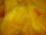 Load image into Gallery viewer, Fur Faux fake Yellow shaggy faux fur  fabric sold per yard 60" Wide
