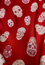Load image into Gallery viewer, White Skull on red  Stretch Spandex Fabric by the yard 60 " Wide
