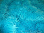 Load image into Gallery viewer, Turquoise Mongolian shaggy faux fur  fabric per yard
