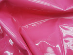 Load image into Gallery viewer, Candy pink  patent faux vinyl upholstery fabric per yard Ships ROLLED
