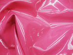 Load image into Gallery viewer, Candy pink  patent faux vinyl upholstery fabric per yard Ships ROLLED

