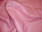 Load image into Gallery viewer, Vinyl faux Pink Soft Skin upholstery/clothing fabric by the yard 55" wide
