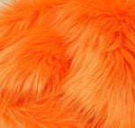 Load image into Gallery viewer, Orange  shaggy faux fur upholstery fabric  yard 60" wide
