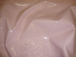 Load image into Gallery viewer, Pale pink patent faux vinyl upholstery fabric per yard
