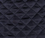 Load image into Gallery viewer, Satin quilted black or white fabric with batting 58" Wide

