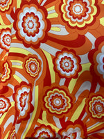 Load image into Gallery viewer, Funky orange  floral stretch spandex fabric SOLD BY YARD 60

