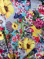 Load image into Gallery viewer, Stretch spandex/ Fantasy multi floral fabric SOLD BY YARD 60” wide
