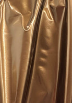 Load image into Gallery viewer, Vinyl Fetish bronze fabric per yard 54" Wide sold by the yard
