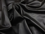Load image into Gallery viewer, Vinyl Faux leather Black Soft Skin Clothing / Upholstery PVC vinyl fabric per yard 54" Wide
