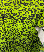 Load image into Gallery viewer, Neon green leopard  nylon spandex iridescent foil 4way 58/60"
