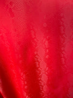 Load image into Gallery viewer, Red matte stretch vinyl fabric costumes, leggings, clothing  Sold by the Yard.
