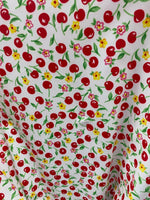 Load image into Gallery viewer, Stretch Spandex cherry on white fabric per yard 60" wide

