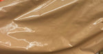 Load image into Gallery viewer, Caramel Vinyl Fetish Wet Clothing fabric per yard 54" Wide sold by the yard
