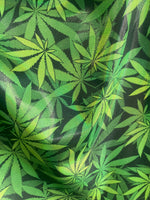 Load image into Gallery viewer, Mystique hologram Green spandex  FLOWER  (PLANT) leaves print sold by the yard
