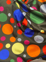 Load image into Gallery viewer, Multi big polka dot on black charmeuse Fabric / 58" WIDE / sold by the yard

