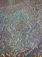 Load image into Gallery viewer, Iridescent lavender damask sequin on stretch nude mesh fabirc 54” wide
