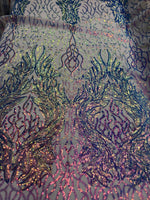Load image into Gallery viewer, Iridescent purple damask sequin on stretch nude mesh fabirc 54” wide
