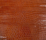 Load image into Gallery viewer, Cinnamon Crocodile embossed Faux vinyl Upholstery 54” wide

