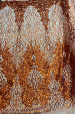 Load image into Gallery viewer, Orange damask sequin on stretch nude mesh fabirc 54” wide
