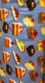 Load image into Gallery viewer, Cake Fleece on blue By The Yard 60" Wide
