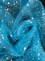 Load image into Gallery viewer, Star sparkle Bursts Sheer on turquoise Organza 58 Inch Wide Fabric
