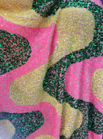 Load image into Gallery viewer, Pink/ yellow sequin Wave Design On green stretch velvet all over 5mm sequins 2-way stretch, sold by the yard.
