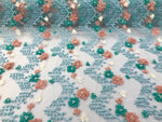 Load image into Gallery viewer, Aqua 3d multi color flowers embroidery with pearl chevron design scalloped, sold by the yard 54” wide
