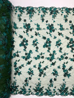 Load image into Gallery viewer, Hunter green Multi color 3d floral Daisy design embroider with pearls in a mesh lace fabric -sold by the yard.
