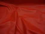 Load image into Gallery viewer, Red Solid Softy 2 way stretch upholstery  Faux vinyl fabric 54" per yard FOLDED
