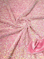 Load image into Gallery viewer, Pearl pink Iridescent On light pink stretch velvet with luxury sequins all over 5mm shining sequins 2-way stretch, sold by the yard.
