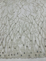 Load image into Gallery viewer, Off White Vine with heavy beading on a mesh lace-sold by the yard.
