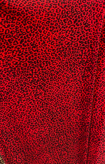 Load image into Gallery viewer, Red black cheetah stretch velvet 58" wide

