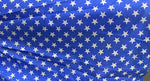 Load image into Gallery viewer, White stars on blue Poly cotton fabric sold by yard  58" wide
