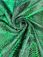 Load image into Gallery viewer, Green foil Snake design on a stretch velvet fabric-Sold by the yard.

